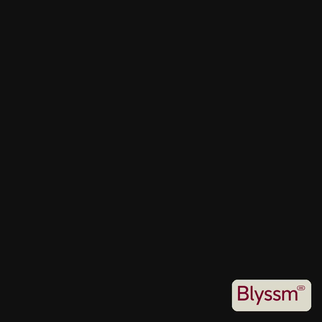 Blyssm Laundry Fur Catcher pads tumbling through a wash and pulling pet hair off a black T-shirt